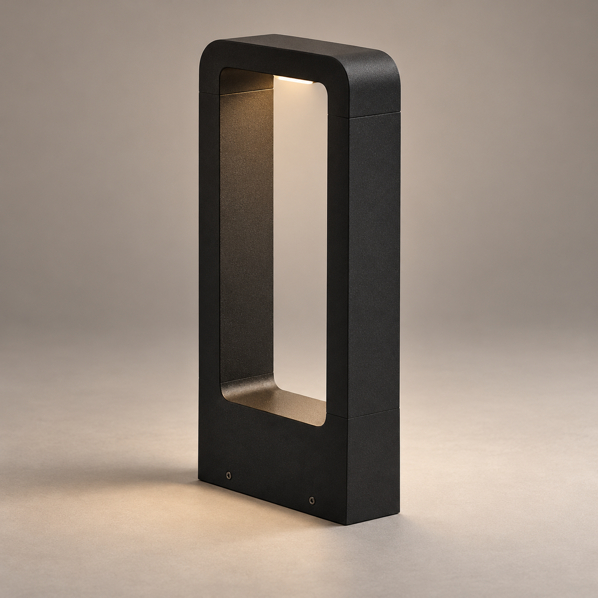 Black rectangular LED bollard on a neutral taupe background