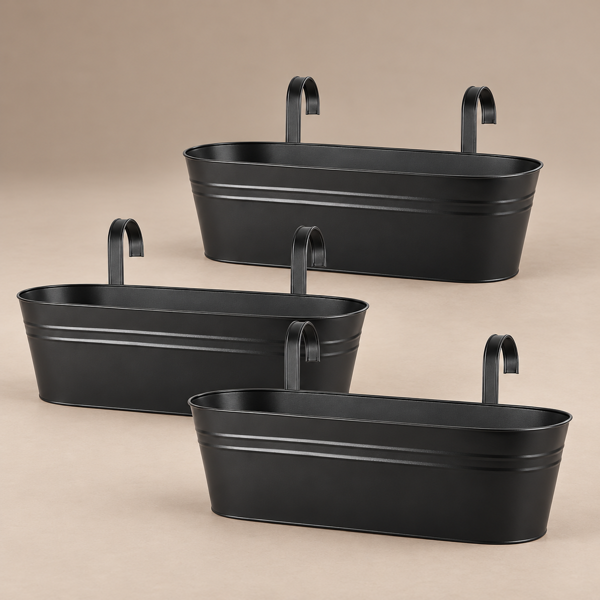 Three empty black metal planters with curved hanging hooks