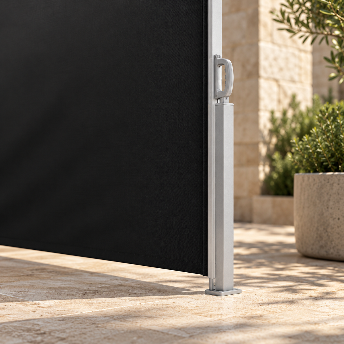 Close-up of the side awning grey pull handle, receiver and black fabric