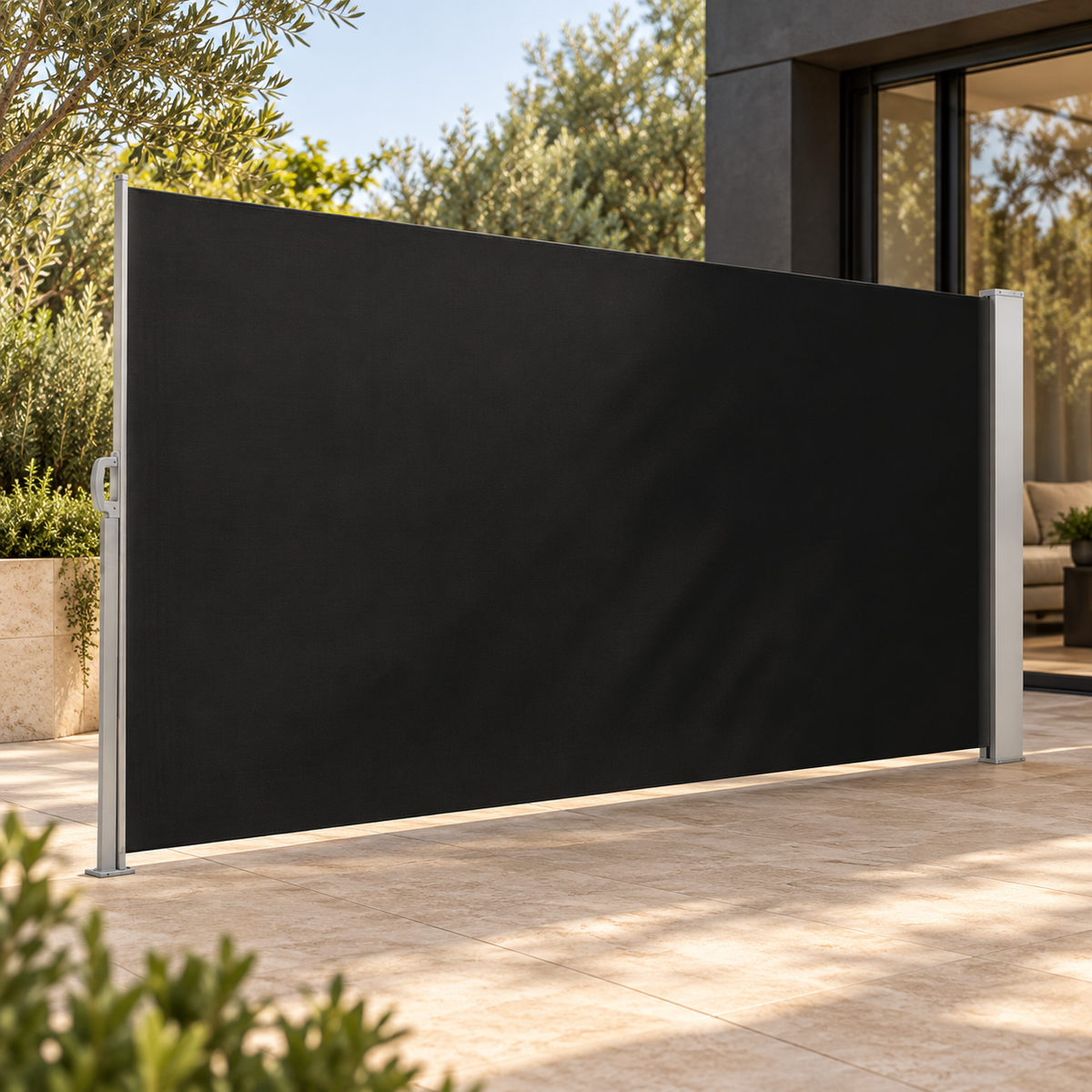 Black side awning with silver-grey hardware beside a charcoal home